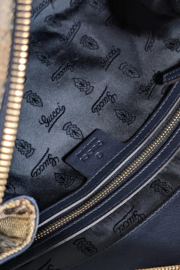 Current Boutique-Gucci - Grey & Navy Monogram Coated Canvas