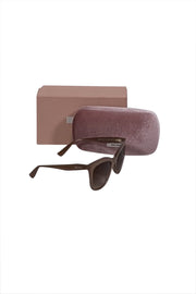 Current Boutique-Miu Miu - Beige Translucent Frames w/ Brown Lenses