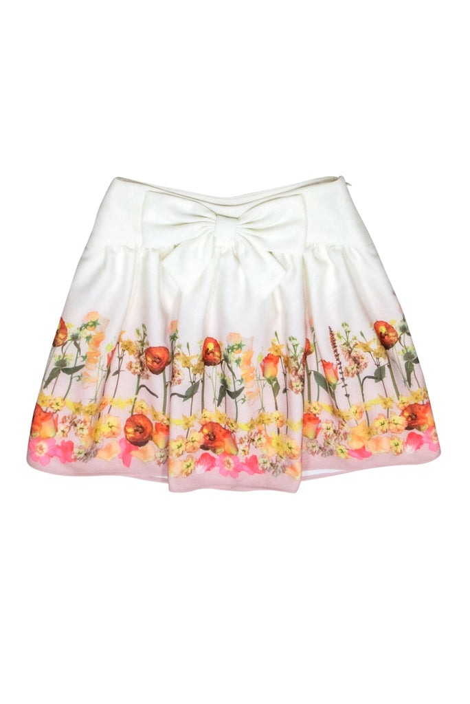 Ivory floral hotsell print mini skirt