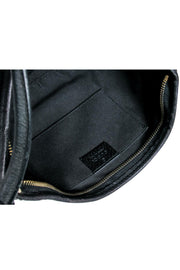 Current Boutique-Gucci - Vintage Black Canvas Logo Embossed Mini Handbag